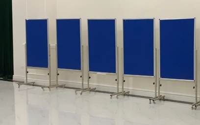 A row of blue boards

AI-generated content may be incorrect.